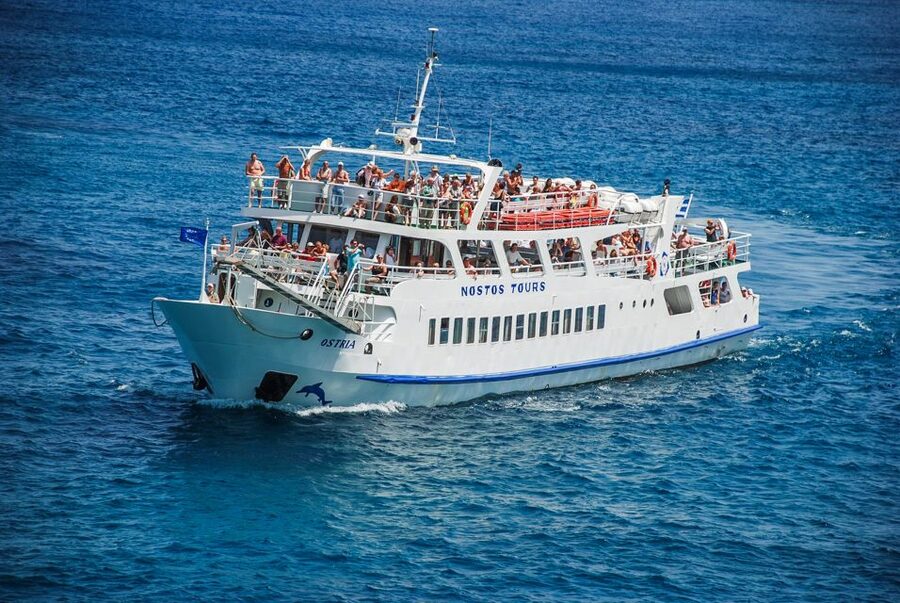 Agios Nikolaos: Boat Trip to Spinalonga with Swim Stop - Arriving at Spinalonga’s fortress