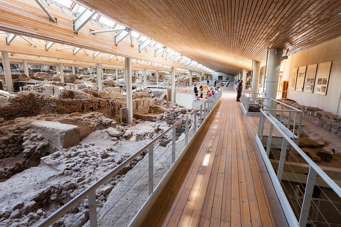 Archaeological Bus Tour To Akrotiri Excavations & Red Beach - Megalochori offers a quieter village view