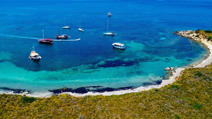 Argostoli: Full-Day Boat Cruise with Lunch - The Artemis water slide and paddle boards