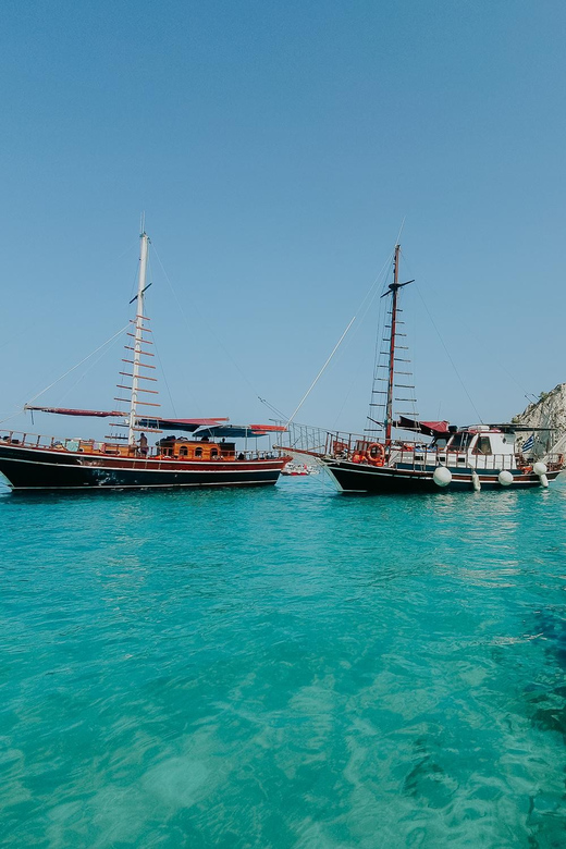 Argostoli: Full-Day Boat Trip with Lunch & Wine - What the Queen Bee crew adds