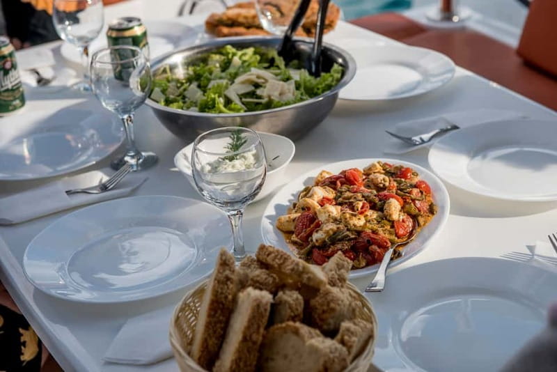 Athens: Half-Day Morning Catamaran Cruise with Meal & Drinks - Crew service and the small-group feel