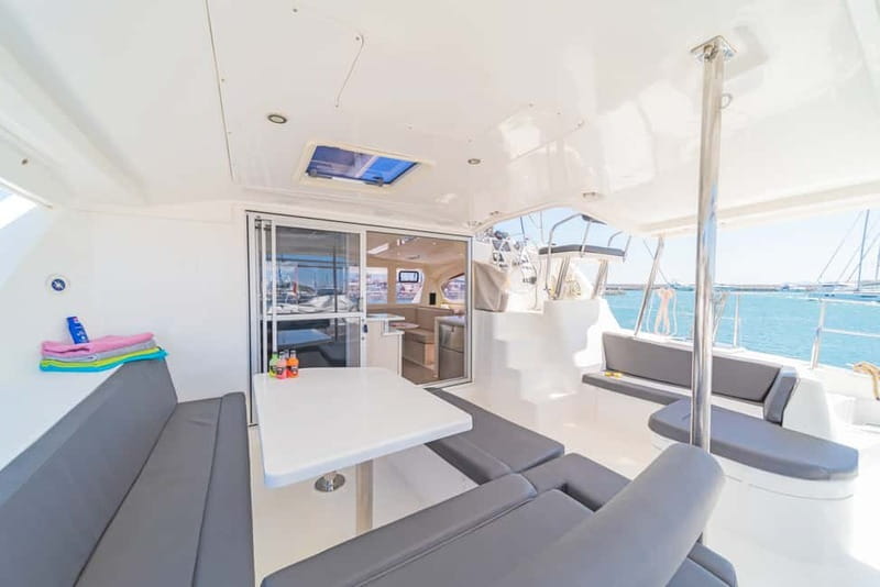 Athens: Half-Day Sunset Catamaran Cruise with Meal & Drinks - Greek meze and seafood pasta on board