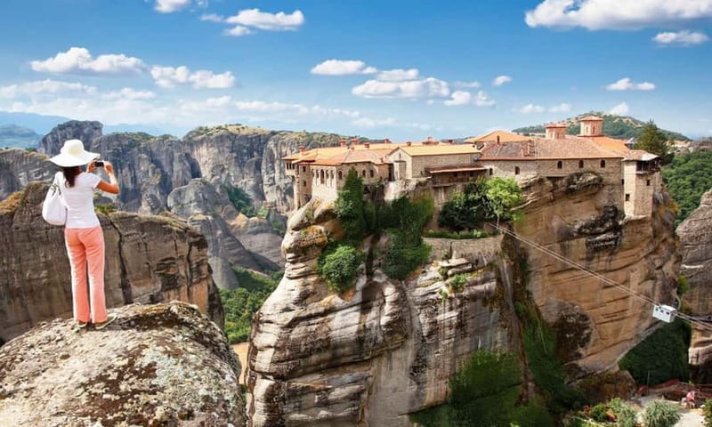 Athens: Meteora Monasteries Day Trip with Caves and Lunch - The first views of Meteora and the Hermit Caves