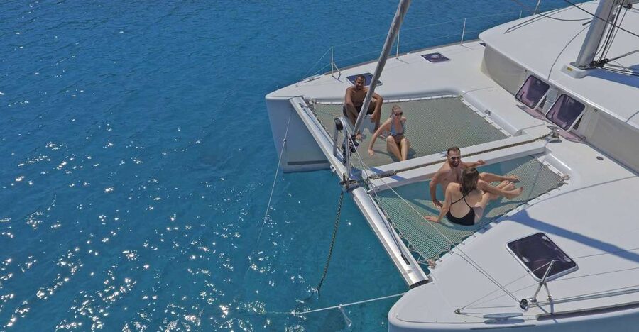 Athens: Riviera Catamaran Cruise with Meal and Drinks - Sailing past Voula and the southern coast