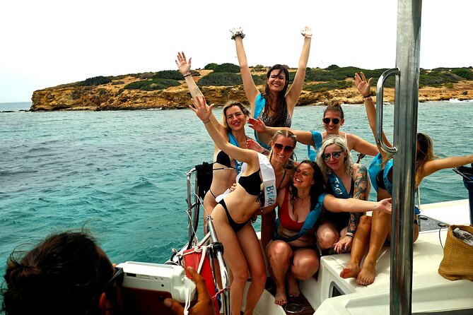 Athens Riviera Catamaran tour with fresh Meal Drinks and Swimming - What the crew adds to the experience