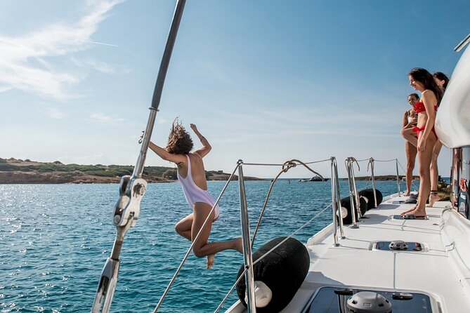 Athens Semi private Morning Catamaran cruise with meal & drinks - Megalo Kavouri: The First Swimming Stop