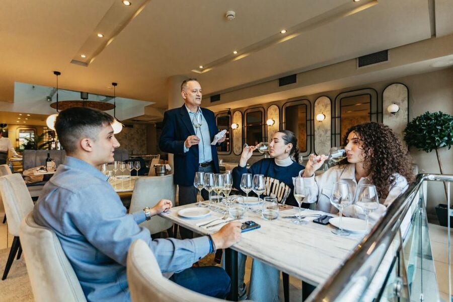 Athens: Wine Tasting with a Sommelier under the Acropolis - The first pour and the Greek wine map