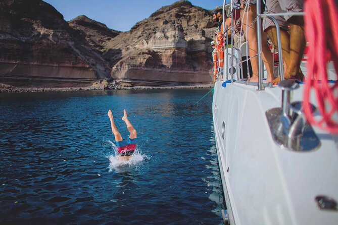 Beautiful Day Catamaran Caldera Cruise incl. Meal & Drinks - Food, drinks, and the social side of the boat