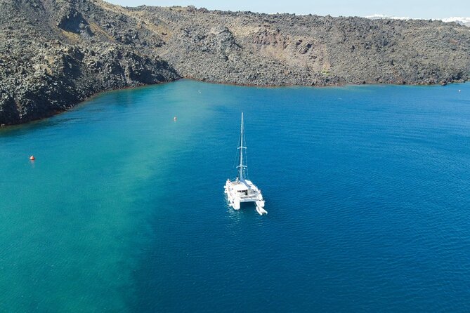 Best of Santorini Private Half-Day Catamaran Cruise with transfer and meal - Palea Kameni and Nea Kameni: Santorini’s volcanic core