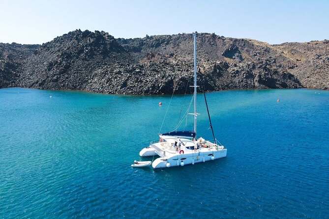 Best of Santorini Private Half-Day Catamaran Cruise with transfer and meal - Red Beach and White Beach: color, rock, and swimming