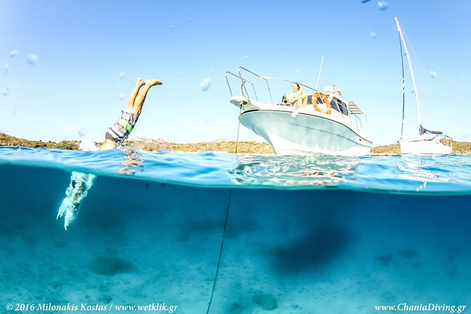 Boat Trip in Crete with Guided Snorkeling and Free Pick up! - The glowing Blue Cave experience