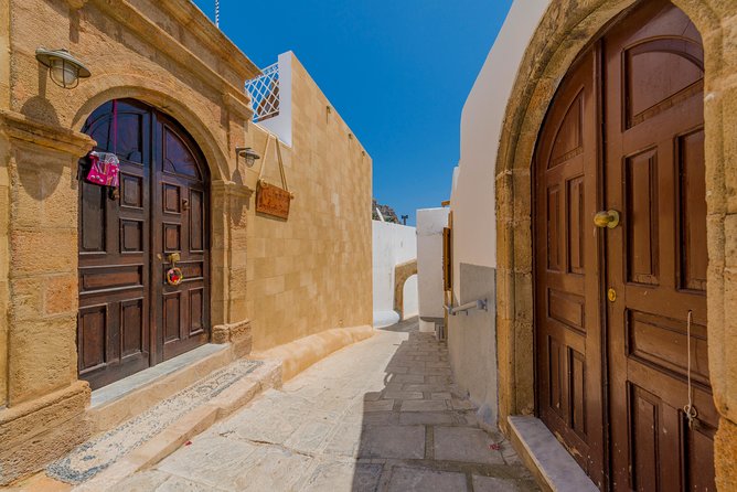 Boat Trip to LINDOS with Swimming Stops at Anthony Quinn's & Tsambika Bays - Three hours in Lindos: ruins, lanes, and the bay