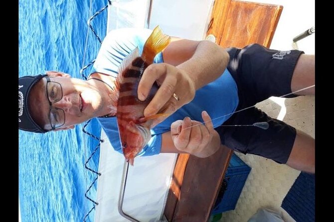 Captain Manolis Fishing with barbecue on the boat - A relaxed morning on the water from Rhodes Town