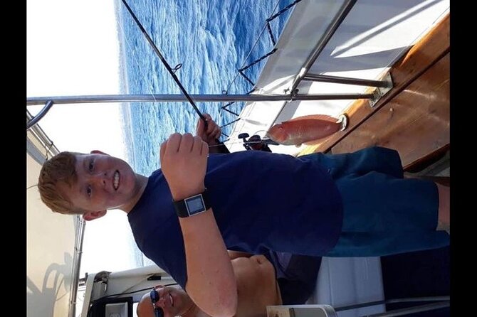 Captain Manolis Fishing with barbecue on the boat - Barbecue lunch with Greek salad and cold drinks