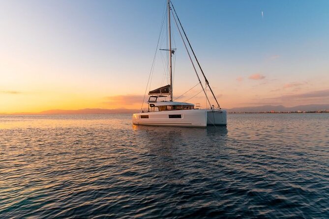 Catamaran Day & Sunset Cruises with meals Drinks and transportation - Seeing Delos from the water