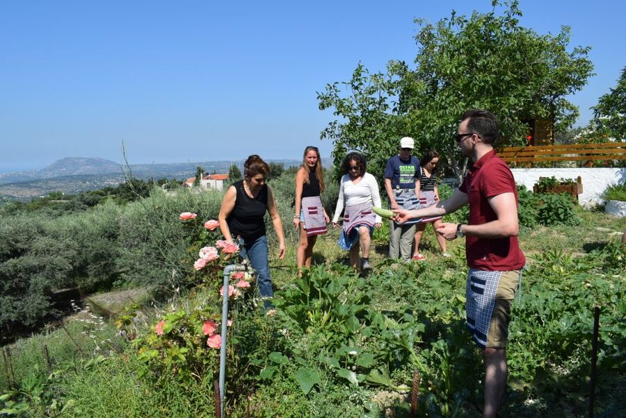 Chania: Authentic Cooking Class in the White Mountains - A garden lesson before the cooking begins