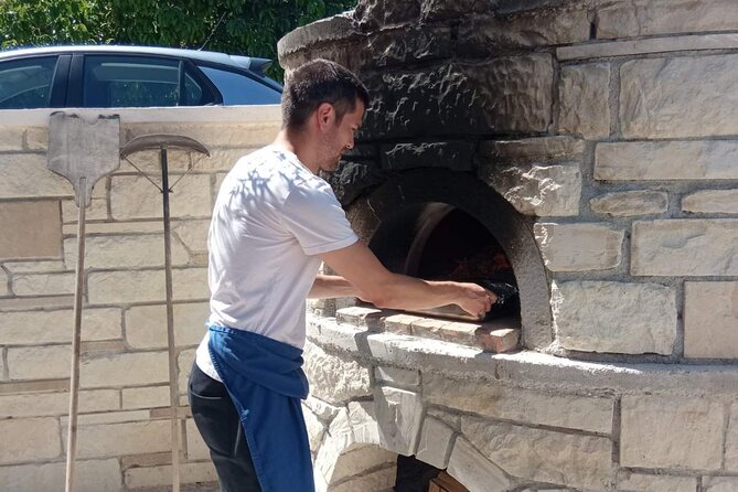 Chania Cooking Class-The Authentic Enjoy traditional Cretan meal - Rolling dough for savory and sweet kalitsounia