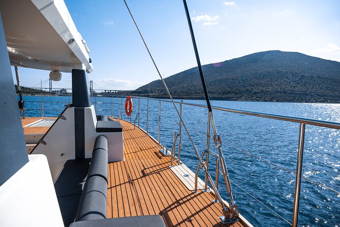 Comfort Max Catamaran Caldera Cruise with BBQ and Drinks - Swimming near Mesa Pigadia, White Beach, and Red Beach