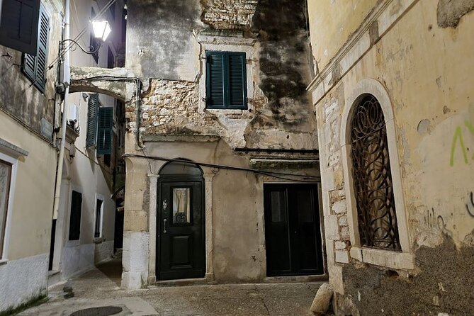 Corfu Ghost Stories, Dark Legends & Facts Night Tour - Following Efi through the cobbled lanes