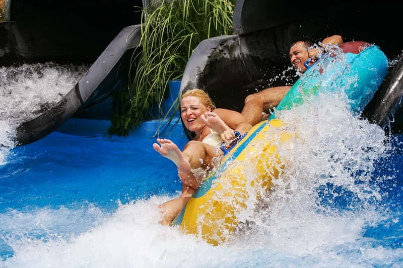 Crete: Acqua Plus Water Park Entrance Ticket with Transfer - The main pool, lazy river, and hydromassage break