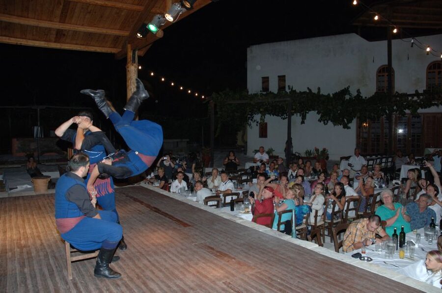 Crete: Traditional Dance Show and Buffet Dinner with Wine - An old village setting instead of a hotel stage