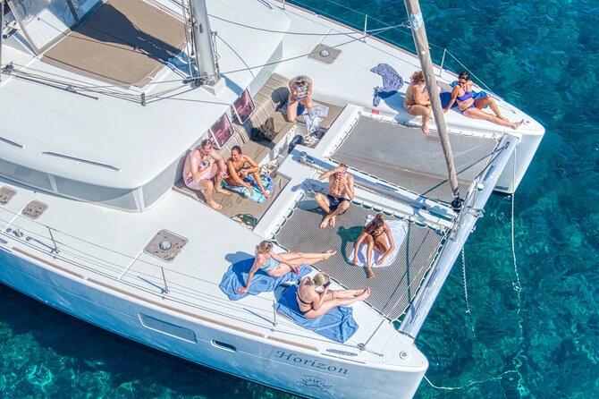 Deluxe Santorini Sailing with BBQ and Drinks Shared Tour - Red Beach and White Beach from the water