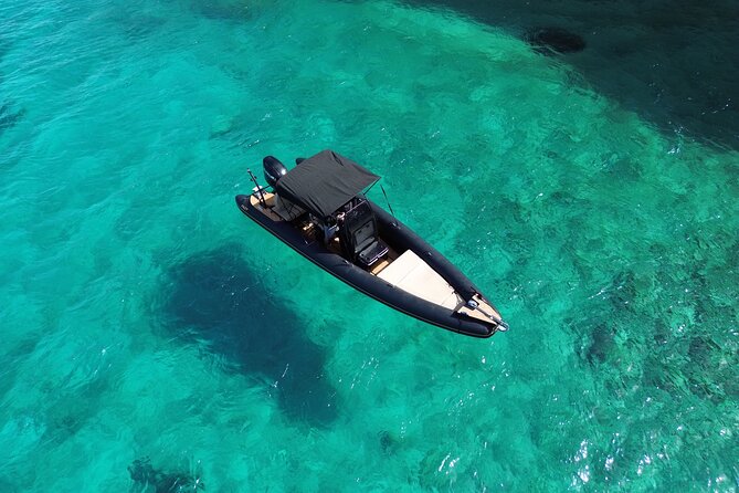 Discover Hidden Gems around Paros | Private Boat Tour - Despotiko: ruins beside clear water
