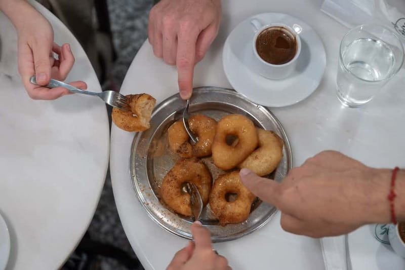 Eat Your Way Through Athens: A Local Food Walk - Tsipouro with cheese, meats, olives, and oil