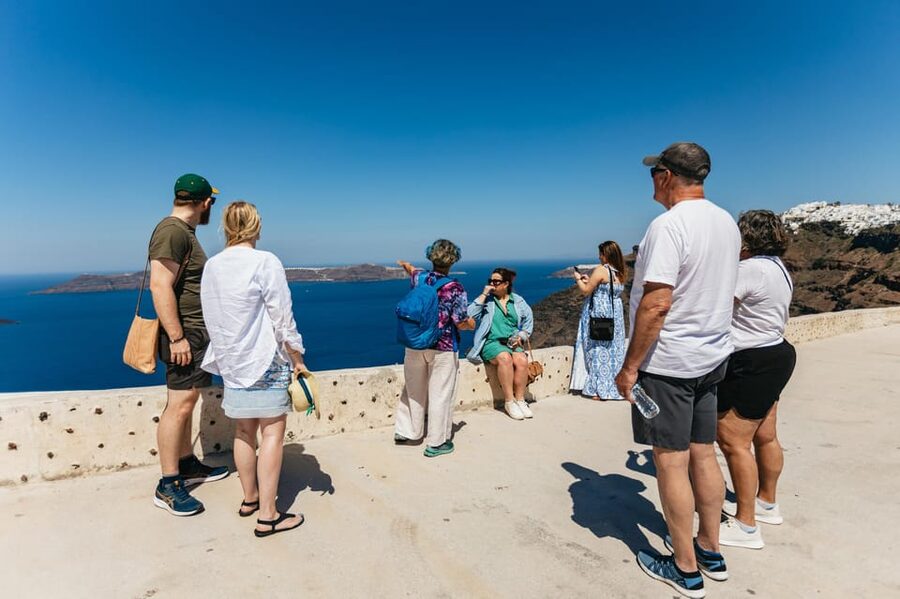 Fira: Guided Foodie Walking Tour with Tastings - Fira’s lanes, market, and local food stops