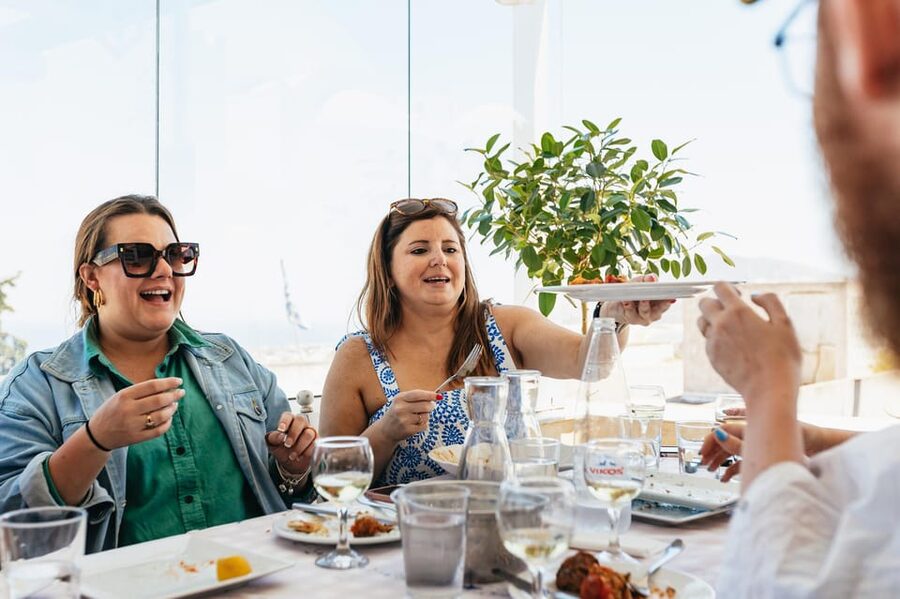 Fira: Guided Foodie Walking Tour with Tastings - The midday tavern meal with caldera views
