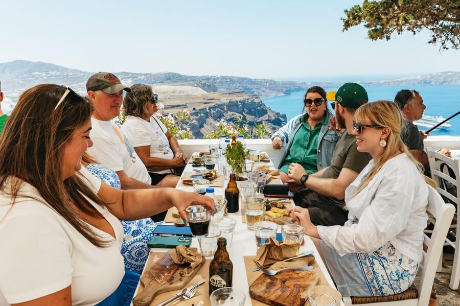 Fira: Guided Foodie Walking Tour with Tastings - The blue dome and the first mezes