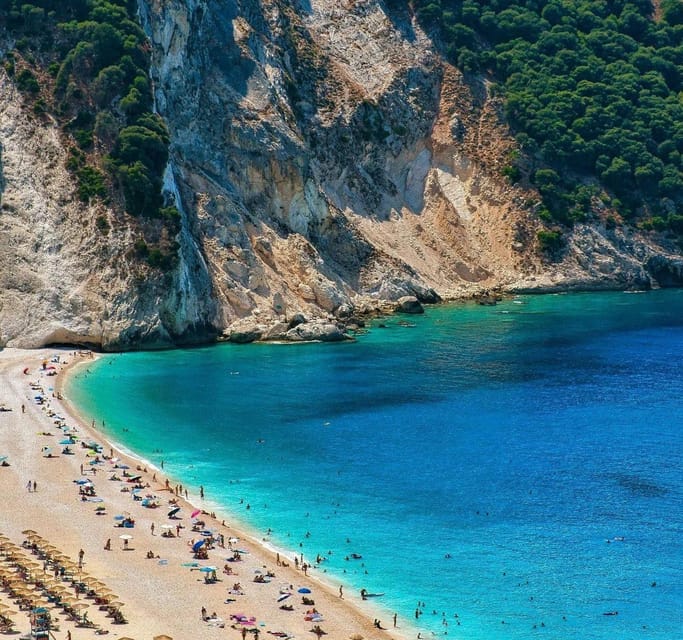 From Argostoli: Melissani Lake and Myrtos Beach Tour - Entering Melissani Lake through the open cave roof