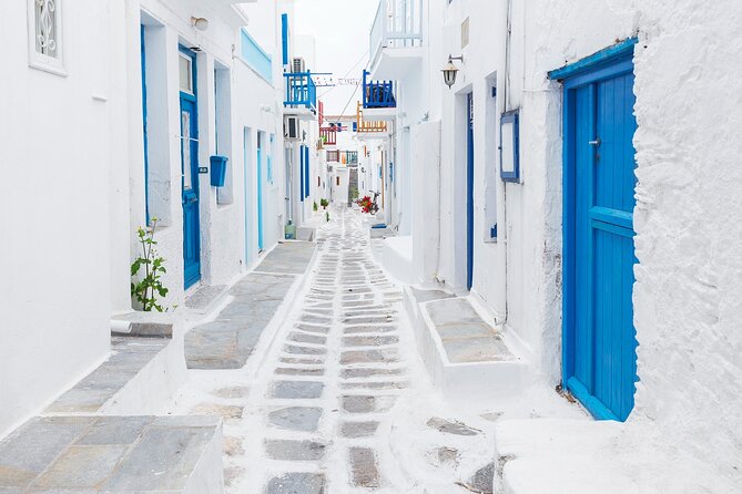 From Athens: Day Tour to Mykonos - The return ferry and late-night arrival in Athens