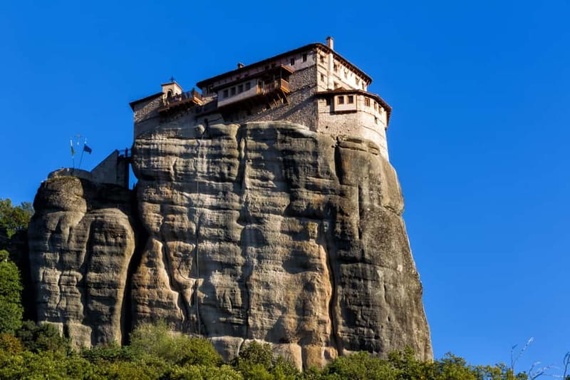 From Athens: Meteora Monasteries and Hermit Caves Tour - Inside three monasteries, with stairs and dress rules