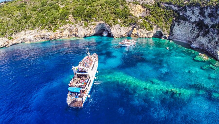 From Corfu: Day Cruise to Paxos, Antipaxos, and Blue Caves - A boat atmosphere that may be lively