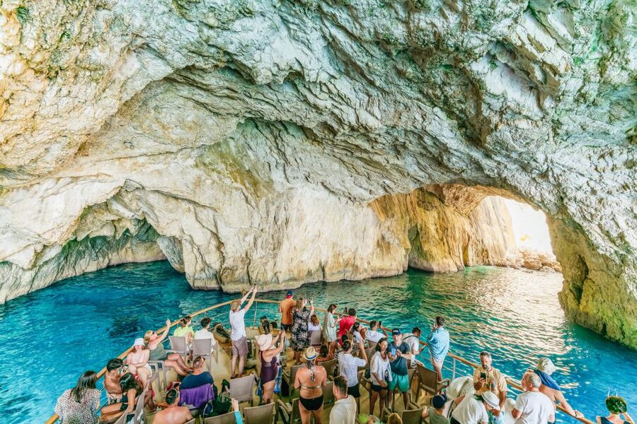 From Corfu Island: Antipaxos & Paxos Blue Caves Boat Cruise - Antipaxos swimming at Mesovrika or Voutoumi