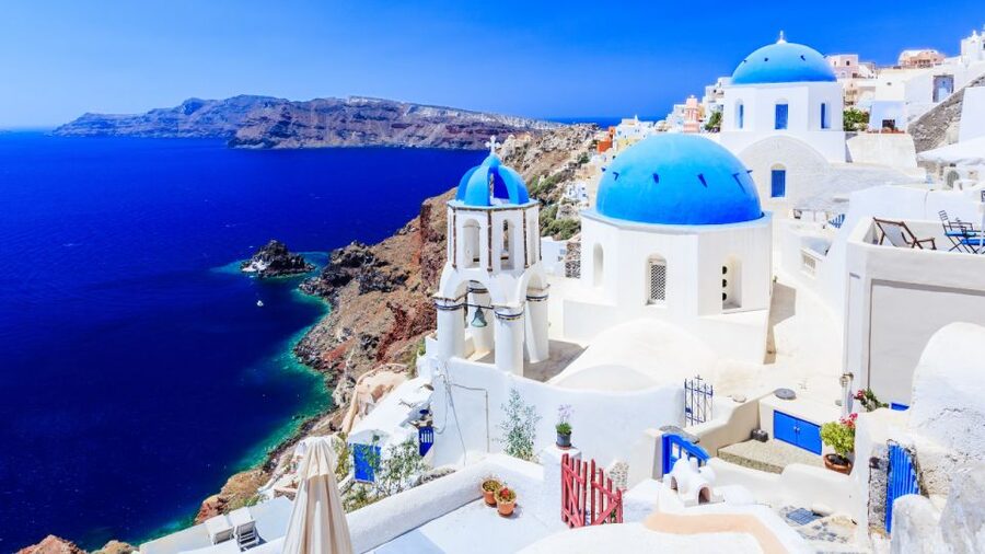 From Heraklion/Crete: Santorini Island Guided Day Trip - Athinios Port and the steep ride to Oia