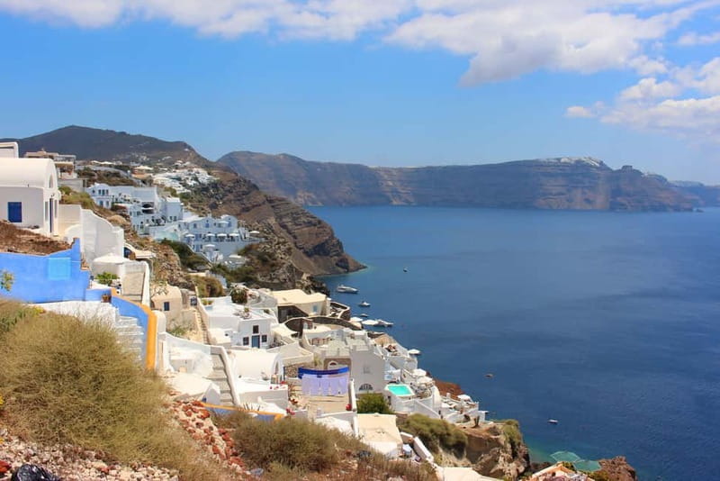From Heraklion: Santorini Full-Day Tour by Boat - First views of Fira above the crater