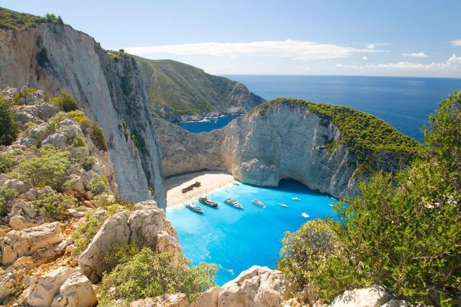 From Kefalonia: Blue Cave Boat Cruise & Shipwreck Photo Stop - Alykanas for lunch and free time