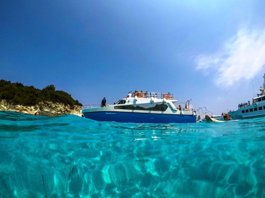 From Lefkimmi: Syvota, Blue Lagoon and Cave Sunset Cruise - Entering the Sivota cave by boat