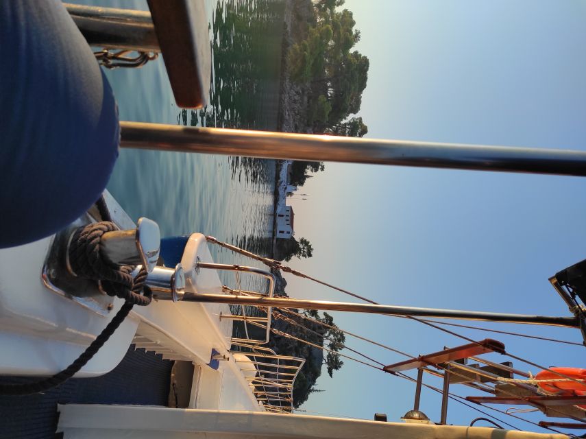 From Parga: Paxos and Antipaxos Cruise with Blue Caves - Voutoumi Beach, the first turquoise-water stop