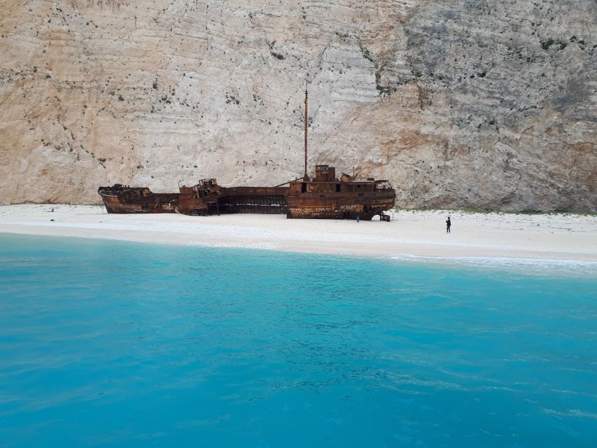 From St.Nikolaos: Boat Cruise to Navagio Beach & Blue Caves - Captains, commentary, and the day-to-day service