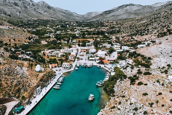 Full Day Boat Cruise to 3 Islands with optional pickup - Vathi and the narrow entrance to Kalymnos