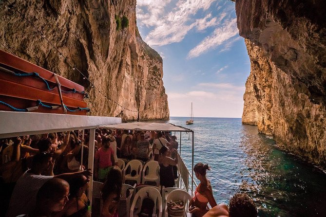 Full-Day Boat Tour of Paxos Antipaxos Blue Caves from Corfu - Languages, seating, and onboard comfort