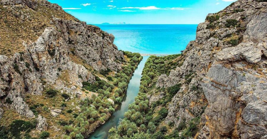 Georgioupolis: Preveli Palm Beach Day Trip by Bus and Boat - Reaching Preveli by water taxi