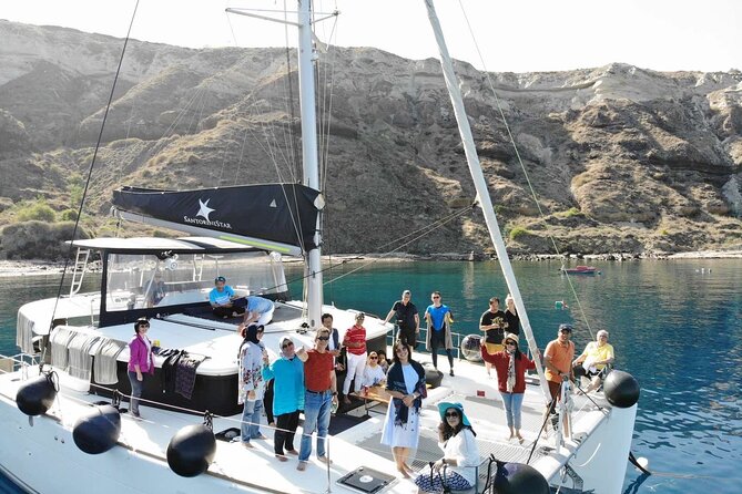 Half-Day Exclusive Catamaran Cruise in Santorini with Meal and Open Bar - Swimming near Santorini Volcano