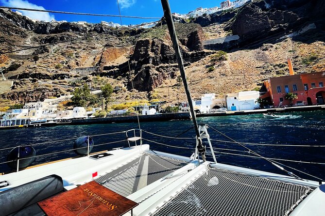 Half Day Premium Catamaran Cruise in Santorini including Oia - The volcano and warm water near the crater