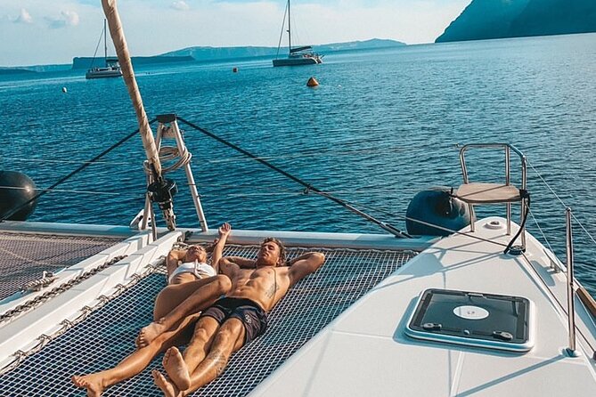 Half Day Premium Catamaran Cruise in Santorini including Oia - The Venetian lighthouse and the best camera moments