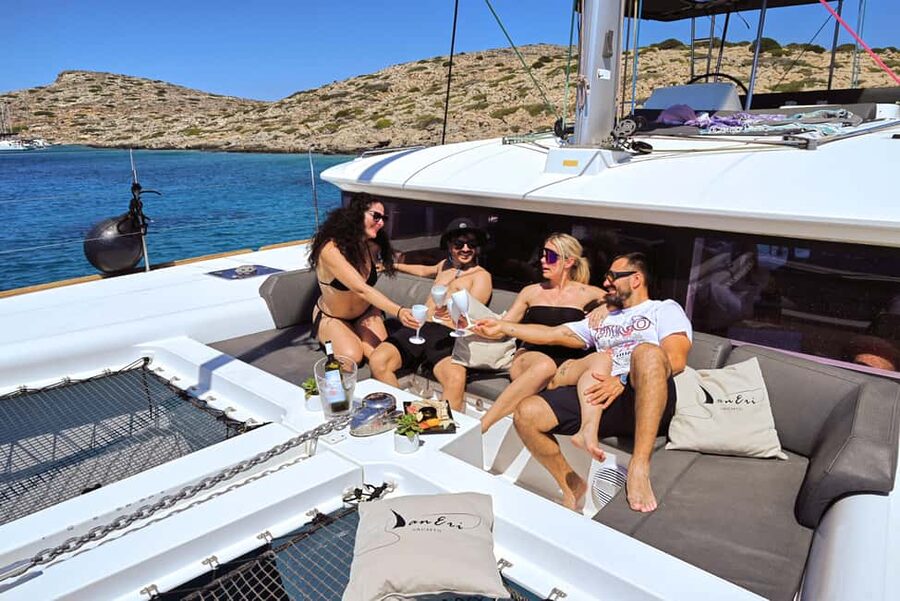 Heraklion: Dia Catamaran Tour - Lunch, Open Bar & Snorkeling - Swimming, snorkeling, SUP, and the inflatable flamingo