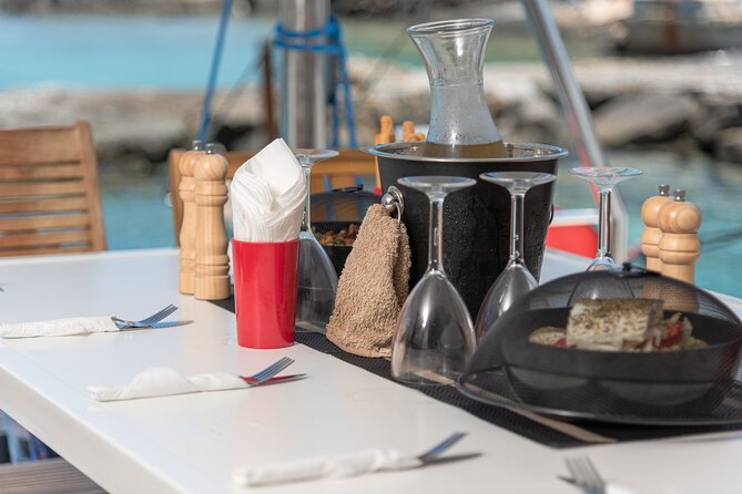 Hersonissos: Luxury Sunset Catamaran Cruise Sushi & Open Bar - Swimming, snorkeling, SUP boards, and gentle fishing